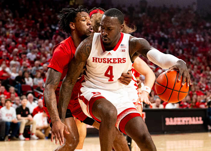 Mar 3, 2024; Lincoln, Nebraska, USA; Nebraska Cornhuskers forward Juwan Gary (4) drives against Rutgers Scarlet Knights guard Jeremiah Williams (25) during the first half at Pinnacle Bank Arena.